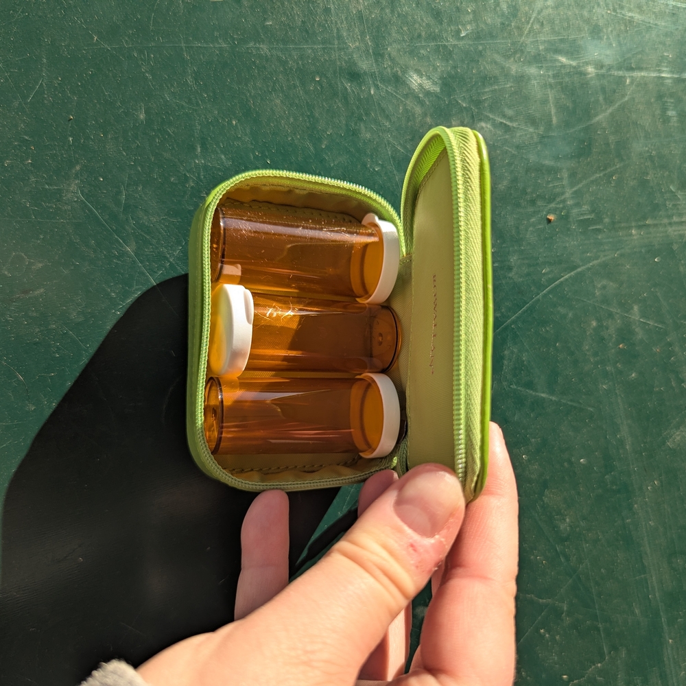 Rowallan Green Cosmetic Bag with Bottles